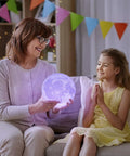 Mother and daughter enjoying Moon Lamp 7.1 Inch 3D Printed Lunar Night Light With 16 Colors Kid Room Decor Soft White To Warm Glow.