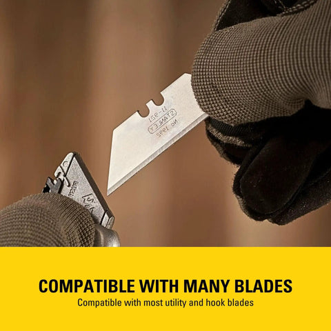 Gloved hand changing blade in a Sport Knife With Easy Blade Change And One Handed Quick Slide Blade Slider Takes Standard Utility Blades Safety Feature Prevents Dual Blades Two And Seven Sixteenth Inch Blade Five And Quarter Inch Handle Silver Finish.