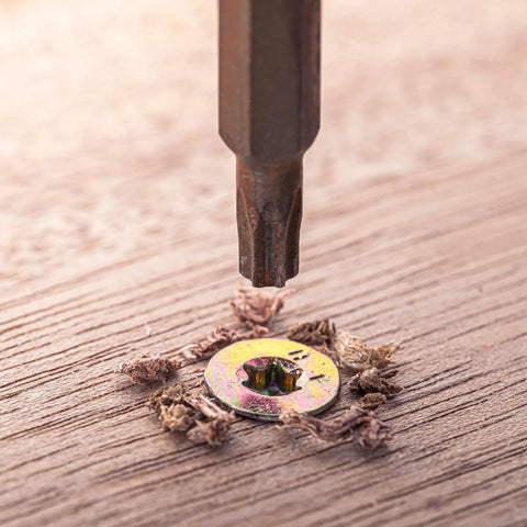 Tough As Nails M4 T20 Torx Screws Flat Head Machine Fasteners 10.9 Grade Alloy Steel Black Oxide Finish being driven into wood.