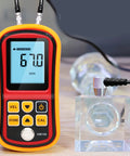 Pro Grade Ultrasonic Thickness Gauge Probe For Metal Testing With Auto Calibration Smart Sensor in use with crystal block