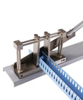Beefy Wire Duct Cutter For Rail Duct No Fuss Tool cutting blue wire duct with clean deburring-free edges and ruler for measurements.