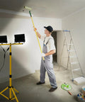 Painter using Two-Head LED Work Light With Adjustable Foldable Tripod Stand, 21000 Lumen Portable Flood Light for illumination