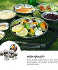 Stainless Steel Outdoor Dining Set With Plates Bowls And Cutlery on a table, ready for beach BBQ hiking and picnics.