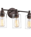 Three Light Vanity Light Fixture For Farmhouse Bathroom With Metal Wall Sconce Clear Glass Shades Oil Rubbed Bronze Finish E26 Base Socket LED Compatible Incandescent Friendly Durable Rustic Modern Look