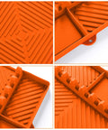 Close-up of orange Silicone Griddle And Grill Mat With Drip Pad For Grill And Kitchen 16 By 11 Point 5 Inch with ribbed texture