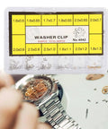 Watch Push Button Washer Set With 12 Sizes Metal Watch Repair Tool Kit organized in a plastic storage box for DIY and professional use