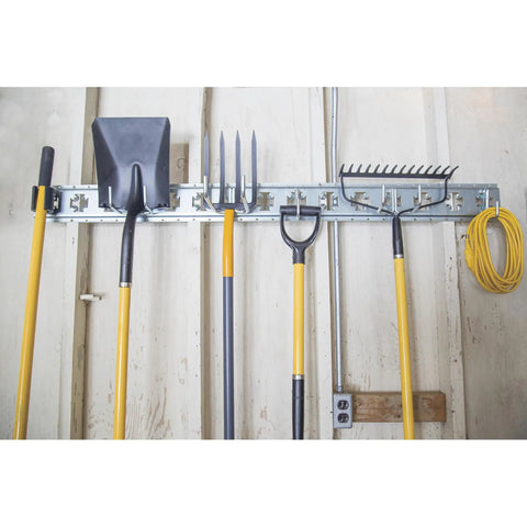 Heavy Duty Dual Arm Tool Hook For E Track And X Track Stores Long Handled Tools Like Brooms And Rakes 200 Lb Capacity Zinc Steel 2.25 Inch Inside Hook Works With Tool Stabilizer For Extra Securement installed on wall with tools