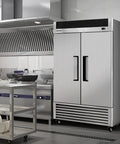 Heavy Duty 49 Cubic Foot Commercial Reach In Refrigerator Two Door Fridge Cooler in a restaurant kitchen with stainless steel finish.