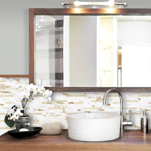 Bathroom scene with Peel And Stick Backsplash Tiles Marble Calacatta With Metal Gold Finish near a mirror and sink area.