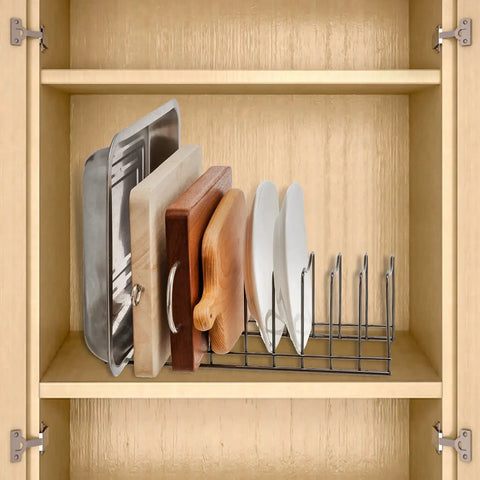 Super Sturdy Stainless Steel Pot Lid Organizer And Cutting Board Rack with various lids and cutting boards in a cabinet.