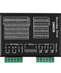 DM556 microstep driver module, front view; black enclosure with green terminal blocks for CNC stepper motors.