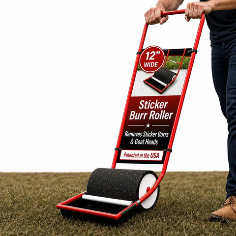 12 Inch Sticker Burr Roller Tool For Yard Cleanup Easy Push Away Goatheads And Grass Burs From Driveways Cars And Shoes Keeping Pets Safe With Innovative Foam Roller Design No More Sticky Mess with red handle on grassy area.