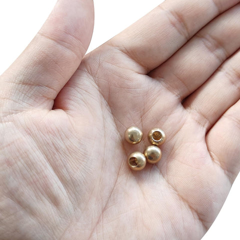 Brass M4x0.7 Thread Cap Nuts 10 Pack No Tool Needed Screw Caps For Furniture And Lighting Decoration Ball Style Nut Covers in hand