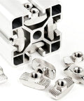 Cool 50 Pack Of Premium M5 T Nuts For 3030 Aluminum Profile Bars close-up of T nuts and aluminum profile, showing design and detail.