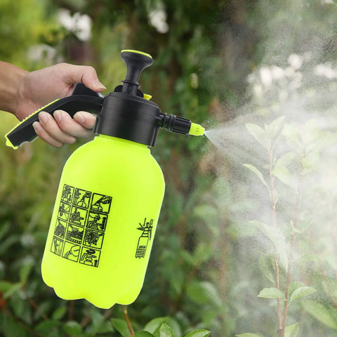 One Hand Operation Garden Sprayer With Adjustable Nozzle Half Gallon Handheld Portable Lawn Sprayer in use on plants
