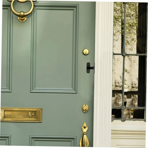 Four Pack Heavy Duty Sliding Door Lock With A Rock Solid 90 Degree Lever And Built Tough Construction installed on green door.