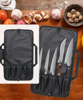 Pro Grade Portable Chef Knife Bag Foldable Knife Roll With Oxford Cloth Storage open showing knives against vegetable background