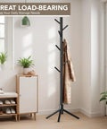 Room with Wooden Tree Coat Rack Stand With Eight Hooks, Freestanding, in corner near windows, showcasing sturdy pine wood design.
