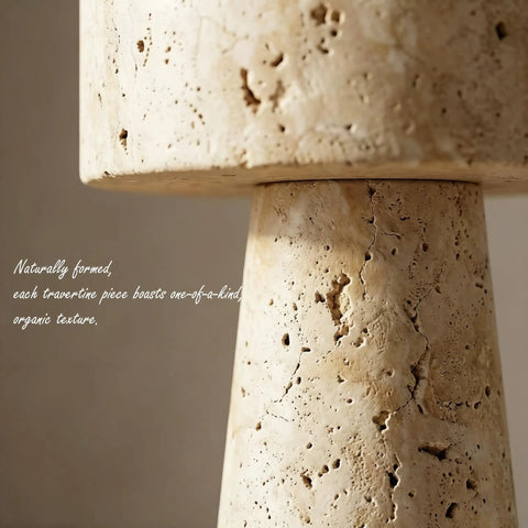 Close-up of Travertine Stone Table Lamp With Warm White LED, showcasing unique natural stone texture and cylindrical base.