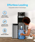 Woman using Bottom Load Water Dispenser For Five Gallon Bottles With Hot Cold And Room Temperature Water with Easy Lift Cabinet open
