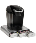 Under Counter Coffee Pod Organizer With Three Drawers, 36 Pod Capacity, Space Saving Countertop Caddy For Your Morning Grab And Go Routine, Silver Finish, Fits Under Most Coffee Makers, shown with coffee maker on top.