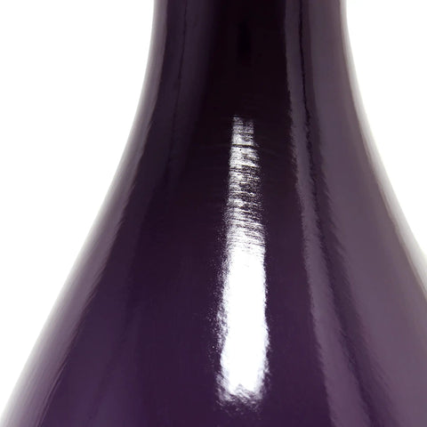Close-up of curved eggplant purple ceramic base from Curved Eggplant Purple Ceramic Table Lamp With Asymmetrical White Shade Tall 29 Inch Accent Light For Living Room Adds Deep Color And Modern Vibe Uses Three Way Bulb