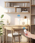 Person using Plug And Play Remote Outlet Switch With Wireless On Off Control For Lamps And Fans Programmable And Compact 100 Ft RF Range FCC Listed Battery Included Easy No Fuss Wiring Setup For Home Automation in home office.