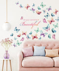 Black Girl Magic Wall Decals You Are Beautiful Inspirational Stickers with colorful butterflies on a nursery wall.