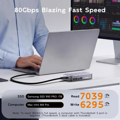 Person using a laptop with Beast Mode Speed M2 Nvme SSD Enclosure with Smart Cooling Fan for fast data transfer.