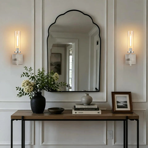 Wireless Wall Sconces with Remote Control, 10000mAh Battery Operated Wall Sconce Set of 2, Brushed Nickel lighted above a console table.