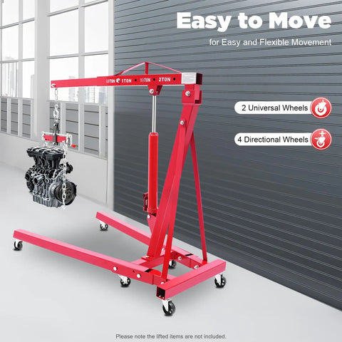 No Sweat Heavy Duty Folding Hydraulic Engine Hoist And Cherry Picker Shop Crane With Adjustable Leveler lifting an engine in a garage setting.