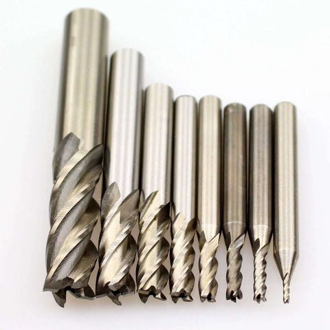 8-piece set of HSS end mills, 4-flute, square-nose, straight-shank, imperial sizes.