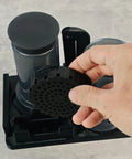 3D Printed Coffee Utensil Station Holder That Keeps Your Kitchen Counter Clean With A Slick Drip Catcher Tray, ergonomic plastic design, drip tray in use.
