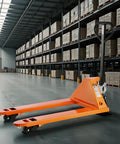 6600 Lb Manual Pallet Jack With 48 By 27 Inch Forks And A 3.35 To 7.1 Inch Lift Height in warehouse