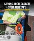 Worker using 1/8 Inch 120 Foot Steel Electrical Fish Tape With Double Loop Tip, Built To Last Heavy-Duty Wire Puller on site