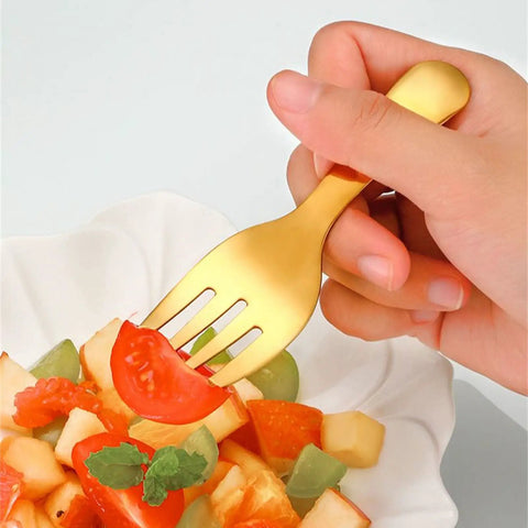Hand holding a fork from 2 Piece Portable Fork And Spoon Set For Camping Picnics And Outdoor Dining Durable Lightweight Cutlery
