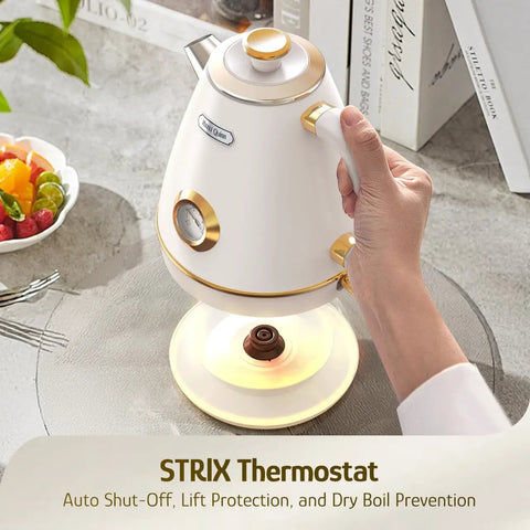 Person using Retro Electric Kettle With Thermometer 1.7 Liter All Stainless Steel 1200 Watt Fast Boil Cordless BPA Free Auto Shut Off With Precise Temperature Reading Pearl White Kitchen Essential For Tea Lovers