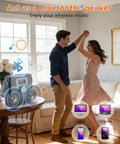 Couple dancing with Portable CD Player With Bluetooth Boombox And Built In FM Radio for camping with LED display and alarm timer.