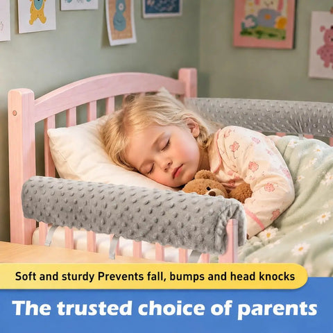Child sleeping next to Toddler Bed Rail Bumper Guard With Memory Foam, Tool Free Attachment For Loft And Bunk Beds