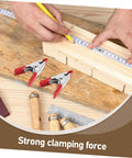 12 Pack Heavy Duty Metal Spring Clamps Kit For Woodworking Pros And DIY Gurus Offering Insane Grip Power For Crafts Dress Fitting Garlands And Household Projects You Need Right Now red metal spring clamps on wood board