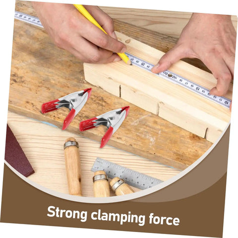 12 Pack Heavy Duty Metal Spring Clamps Kit For Woodworking Pros And DIY Gurus Offering Insane Grip Power For Crafts Dress Fitting Garlands And Household Projects You Need Right Now red metal spring clamps on wood board