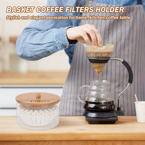 Person using drip coffee maker beside Rustic Glass Coffee Filter Holder With Lid, Easy Access Storage Dispenser For Counter.