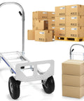 Hulking Aluminum Folding Hand Truck Dolly Built To Crush 800 Pound Loads With Smart Foldable Toe Plate Design next to stacked boxes.