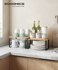 No Sweat Set Of Two Cabinet Organizer Shelves That Serve As A Slick Kitchen Spice Rack And Countertop Pantry Station With Duh Easy Setup and Heavy Duty Build for displaying dishes and kitchenware.