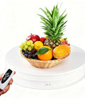Stunning 11.2 Inch Motorized Rotating Display Turntable Stand Handles 44 Lbs Load With Super Quiet Spin For Your Epic Product Videos And Cool Showcase Sets with basket of fruits