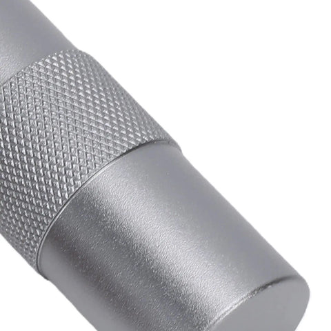 Essential Roadside Tire Repair Kit For Cars And Bikes Capsule Style Puncture Plug Tool close-up of textured handle for grip.