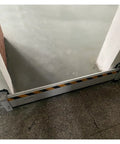 Heavy Duty Aluminum Garage Door Flood Barrier Detachable Water Prevention Shield With Sealing Strip For Driveway Warehouse, positioned at entryway.