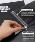 Close-up of hand peeling adhesive strip on Durable Black 14.5x19 Inch Poly Mailers, 100 Pack, Waterproof Self Sealing Shipping Bags