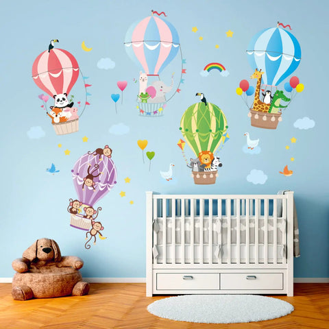 Hot Air Balloon Wall Decals For Kids Room, Cute Animal Cloud Stickers on nursery wall with crib, colorful balloons.