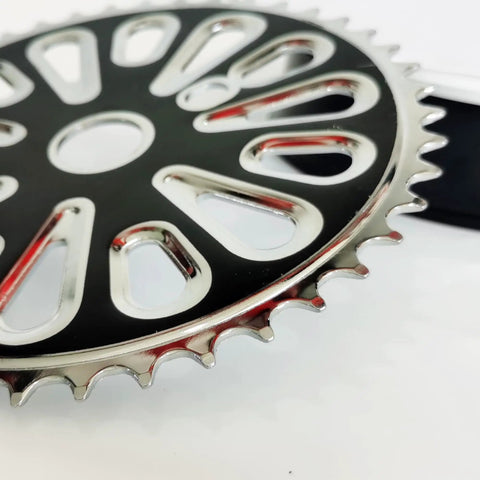 Close-up of black 44 tooth sprocket from the Wide Pedal Crank Kit One Piece Crank for Two Stroke Gas Motorized Bicycle